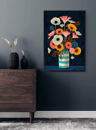 Colorful floral painting titled "I'm Guilty" by David Wolf hanging on a dark gray wall above a wooden dresser.
