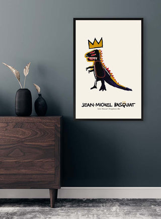 Framed "Don’t Frighten Me" Jean-Michel Basquiat art print displayed on a dark wall above a wooden dresser.