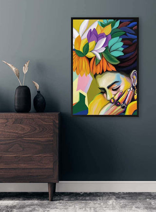 Framed Colorful Thoughts artwork featuring a woman with vibrant flowers above her head, displayed in a modern room.