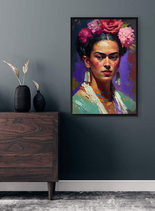 Colorful portrait of a Mexican artist with flowers in her hair, hanging above a modern dresser in a stylish room.