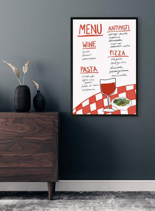 Framed Italian menu poster with wine, pasta, pizza, and antipasti on a red checkered tablecloth background.