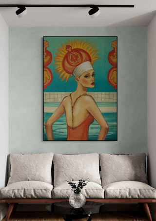 Painting of a woman in swimwear and cap by a pool, displayed above a sofa; Swimmingpool by Martina Karlsson.