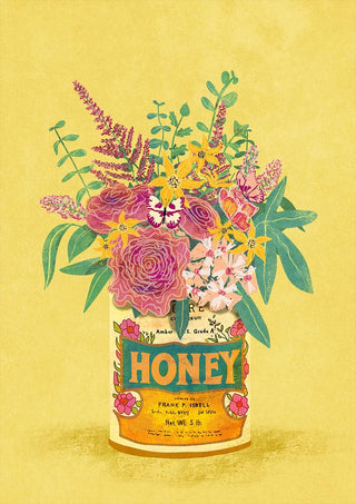 Assorted colorful flowers arranged in a vintage honey can labeled "HONEY" on a yellow background.