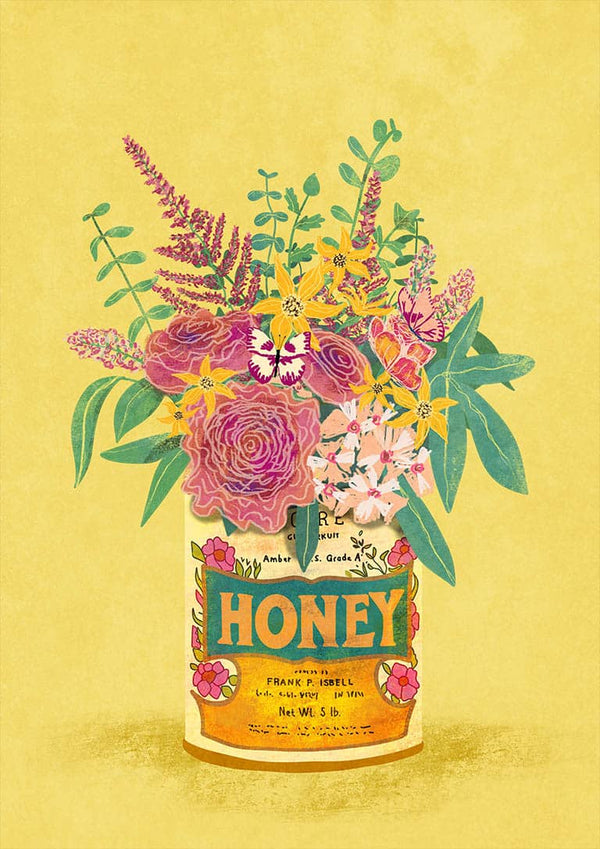 Assorted colorful flowers arranged in a vintage honey can labeled "HONEY" on a yellow background.