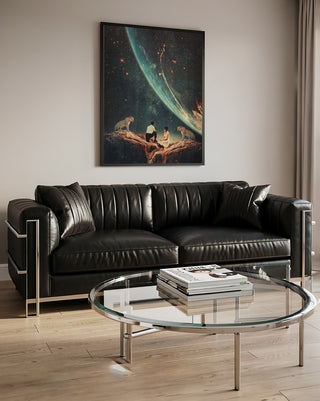 Guardians of Our Future - Frank Moth art print hanging above a black leather sofa in a modern living room.