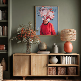 Framed We Gathered In Spring by Frank Moth above a wooden sideboard in a stylish living room setting.