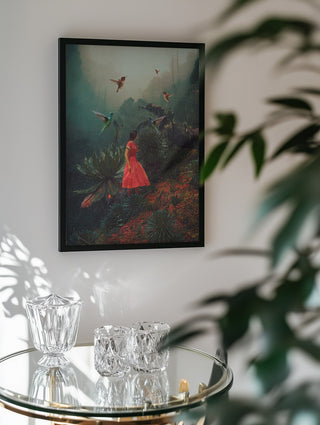Framed "20 Seconds Before the Rain" by Frank Moth hanging above a glass table with crystal decor.