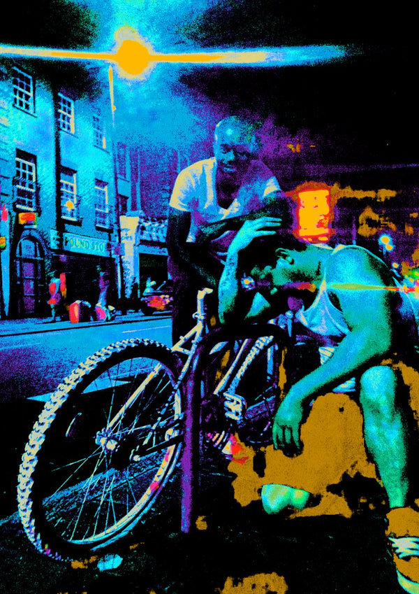 Bike Boys by Pelecan Schneider - two men and a mountain bike on a London street at night in electric blue and magenta