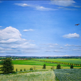 Uhlenhoch - East Germany by Juergen Duerrmann - a wide blue sky over green fields and a distant village