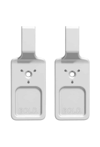 Two white picture hooks for walls, rectangular with a central hole and the word "BOLD" embossed at the bottom.
