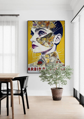 Poster of "It Ain't Cooking" by Tara Green hanging on a white wall above a potted plant in a modern room.