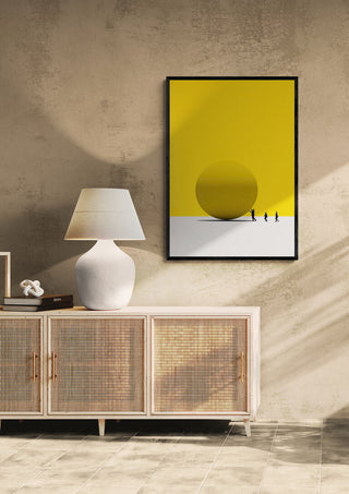 Framed "Overcome - Martin Zen" artwork with yellow background above a modern sideboard and lamp.