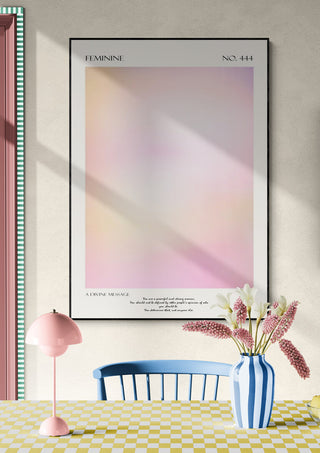 Feminie No. 444 pastel gradient art print on wall above a vase with flowers and a pink table lamp.