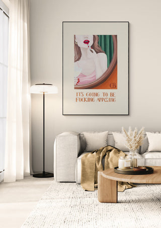 Modern living room featuring the "Fucking Amazing - Christine Buchholtz" art print above a neutral sofa.