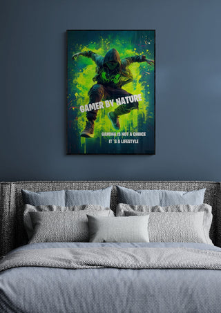 Poster of a gamer in a green hoodie with "Gamer by Nature" text, hanging above a modern grey bed.