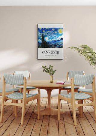 Starry Night Rhone - Van Gogh poster displayed above a wooden dining table set with four chairs in a modern room.