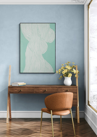 Fibers No 1 abstract wall art above a wooden desk with a vase of yellow flowers and a brown chair.