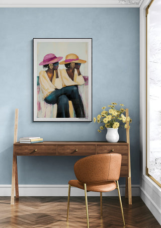 Framed "Break" by David Wolf art print above a wooden desk with flowers in a modern, light-filled room.