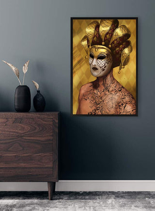 Framed "The Joker" poster featuring a tattooed figure in a gold jester mask, displayed on a dark wall.