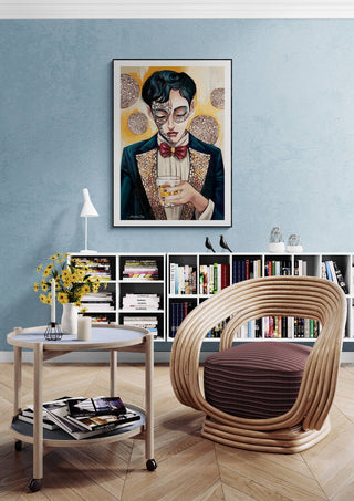Two - Martin Zen artwork framed on a blue wall above a modern chair and bookshelf in a stylish living room.