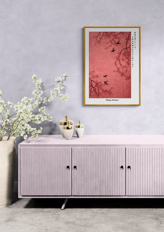 Framed Wings of Dawn - Japandi Woodprint art above a pastel console with white flowers in a modern room.