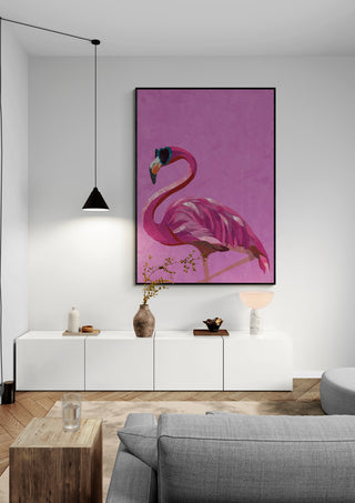 Framed Magenta Metallic Flamingo artwork by Sarah Manovski displayed in a modern living room setting.