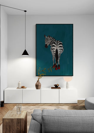 Large wall art of a zebra wearing red heels, displayed above a modern white sideboard in a stylish living room.