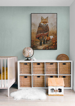 Nursery room with a Fox Out The Box fox illustration above wicker basket storage and globe.