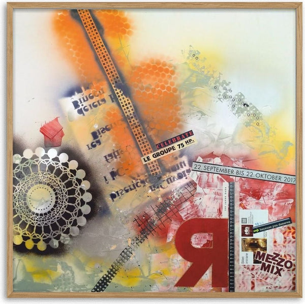 Celebrate by Dada - orange honeycomb spray and printed strips across a white board with a red backwards R