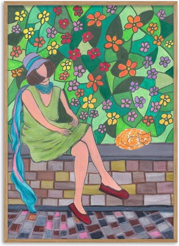 The Garden Wall by Camilla Nilsson - a woman and a ginger cat on a brick wall before a flowered hedge