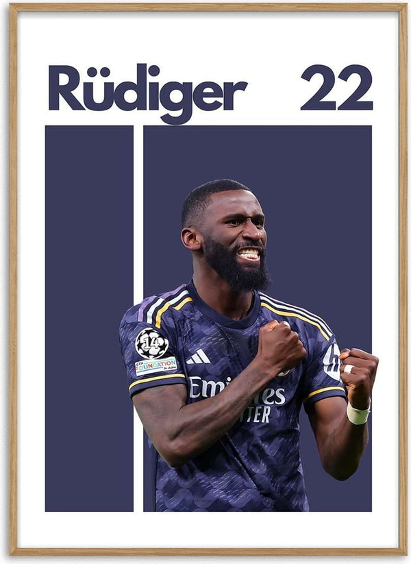 Antonio Rüdiger celebrating in a dark football jersey, with "Rüdiger 22" displayed above.