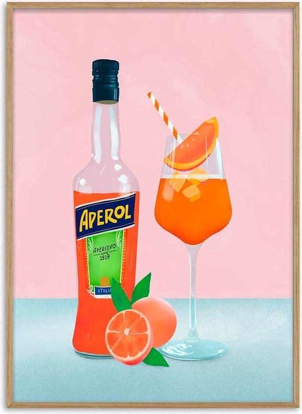 Aperol bottle and spritz cocktail with orange slice garnish and striped straw, next to fresh oranges.