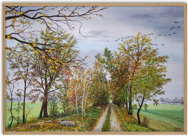 Autumn in Mecklenburg by Juergen Duerrmann - a rutted track between yellow autumn trees under a grey sky