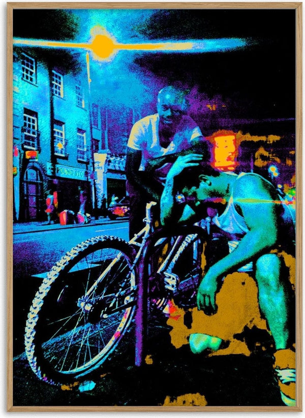 Bike Boys by Pelecan Schneider - two men and a mountain bike on a London street at night in electric blue and magenta