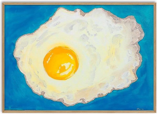 Fried egg by Sulaika Martis - a fried egg with a glowing orange yolk on a deep blue ground