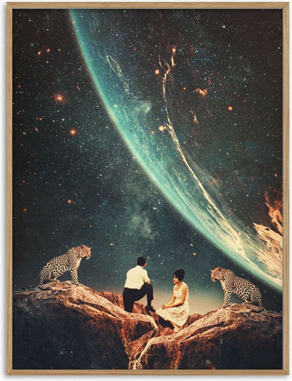 A man and woman sit on a rocky ledge with two leopards, gazing at a vast cosmic sky and distant planet.