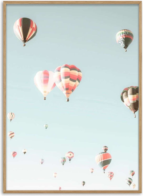 Colorful hot air balloons float against a clear blue sky, featured on the Hot Air Balloons Plakat product page.