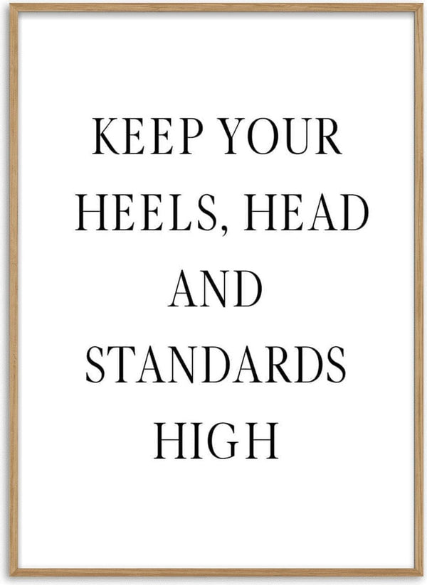 Minimalist poster with the text: "KEEP YOUR HEELS, HEAD AND STANDARDS HIGH" in black font on white background.