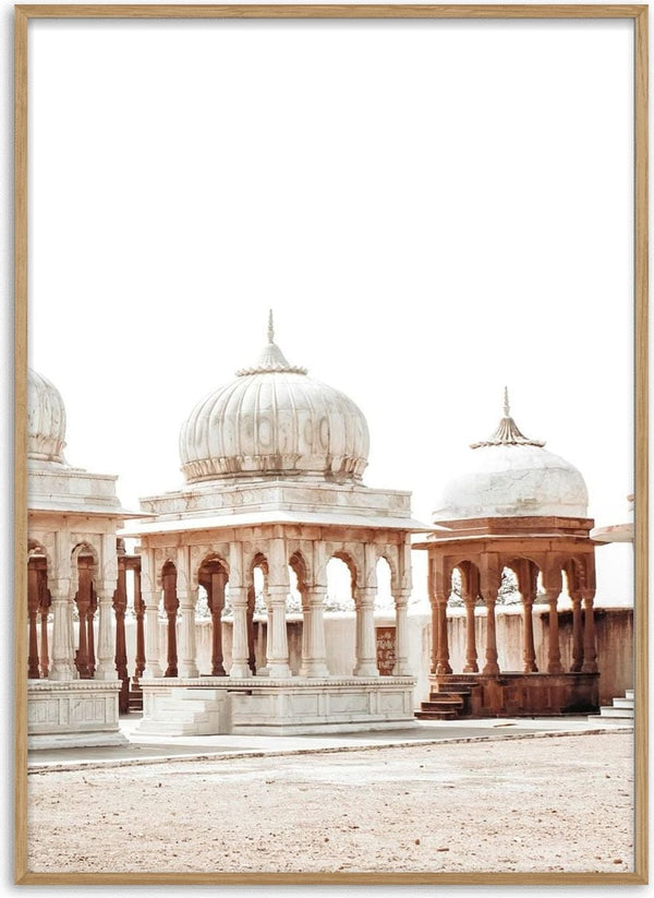Poster of ancient marketplace with ornate stone pavilions and domes under a bright, clear sky.