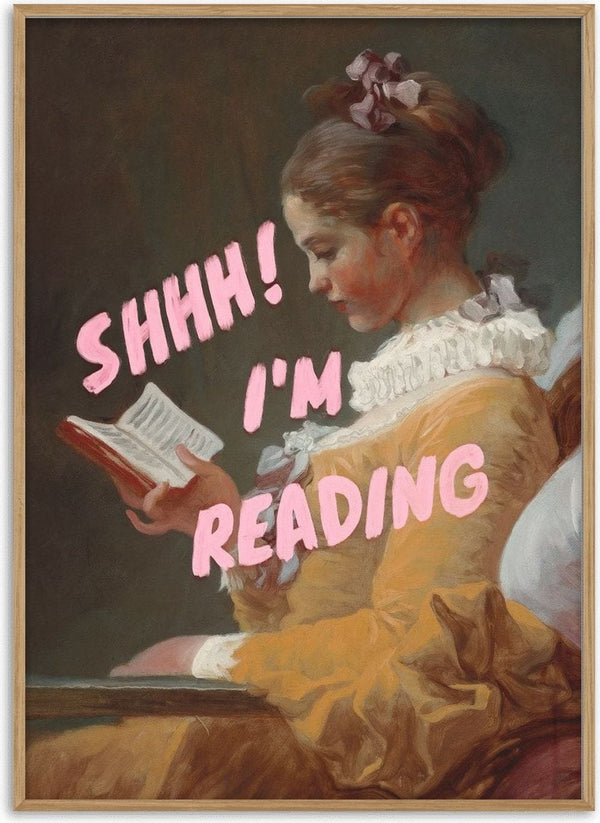 Shhh I'm Reading by Jonas Loose - pink brush capitals over a young woman in a yellow dress reading a book