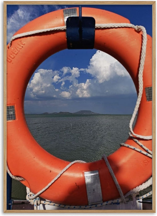 Three Layers of Presence by Bora Kőhalmi - an orange lifebuoy framing the green water and blue hills of Lake Balaton