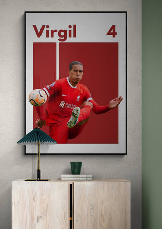 Virgil van Dijk Football Poster featuring him in a Liverpool kit, mid-action with the ball, on a modern wall.